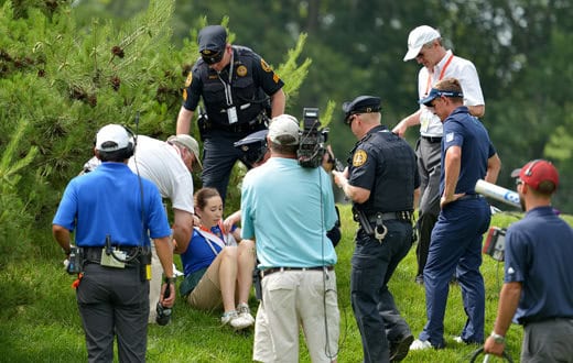 US Open golf: Luke Donald knocks over standard bearer