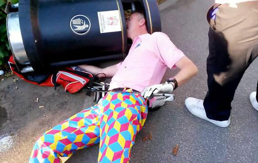 Golfer gets head stuck in a bin after bad round