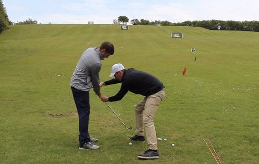 How to play a low wedge shot into the wind