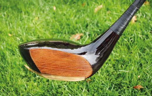 Golf equipment: The 10-foot long, antique wooden driver