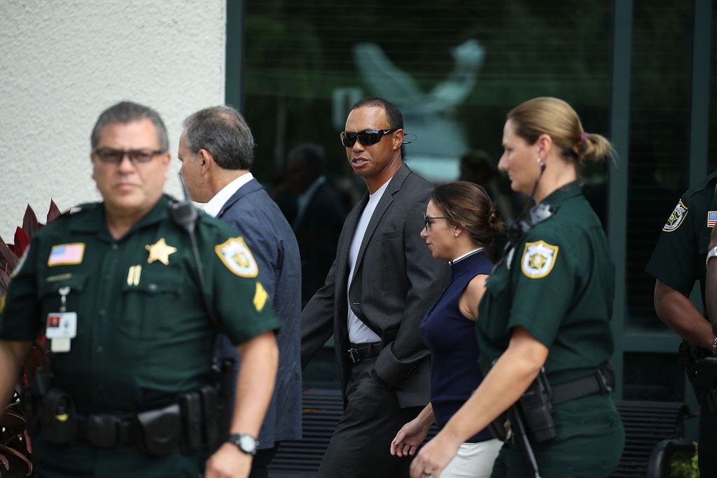 Woods pleads guilty to reckless driving