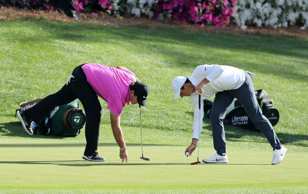 Rory McIlroy and Patrick Reed