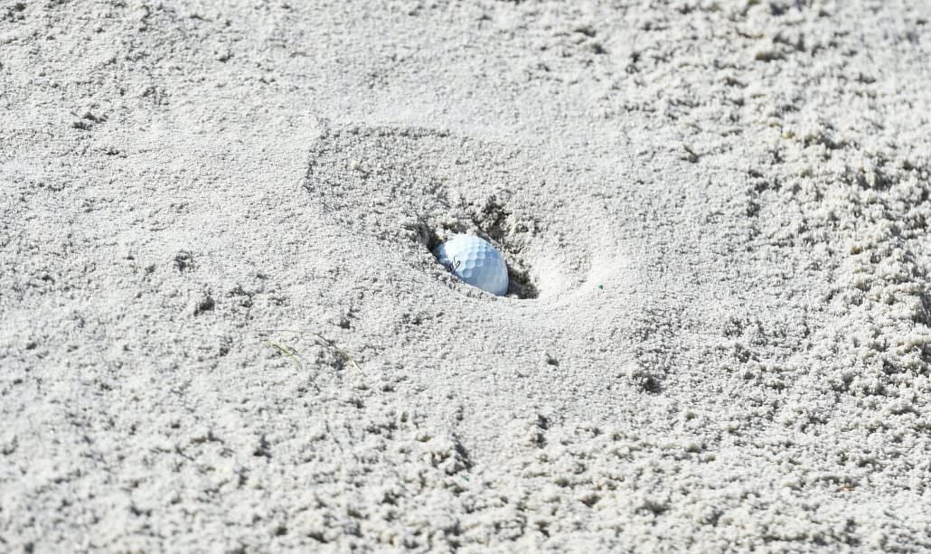 plugged ball in bunker