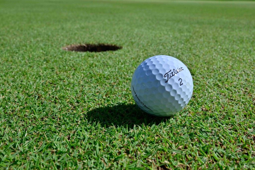 backstopping ball moves on green