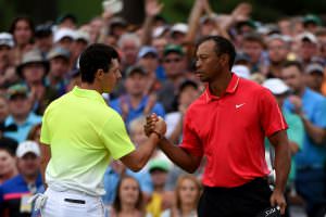 Rory McIlroy and Tiger Woods shaking hands