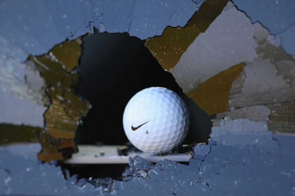 Golf ball smashed through window