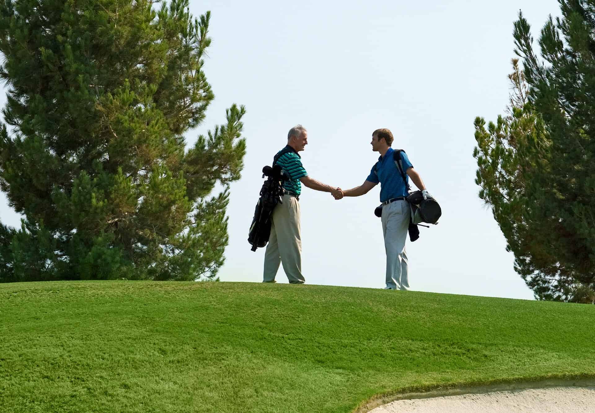 Golfers shaking hands