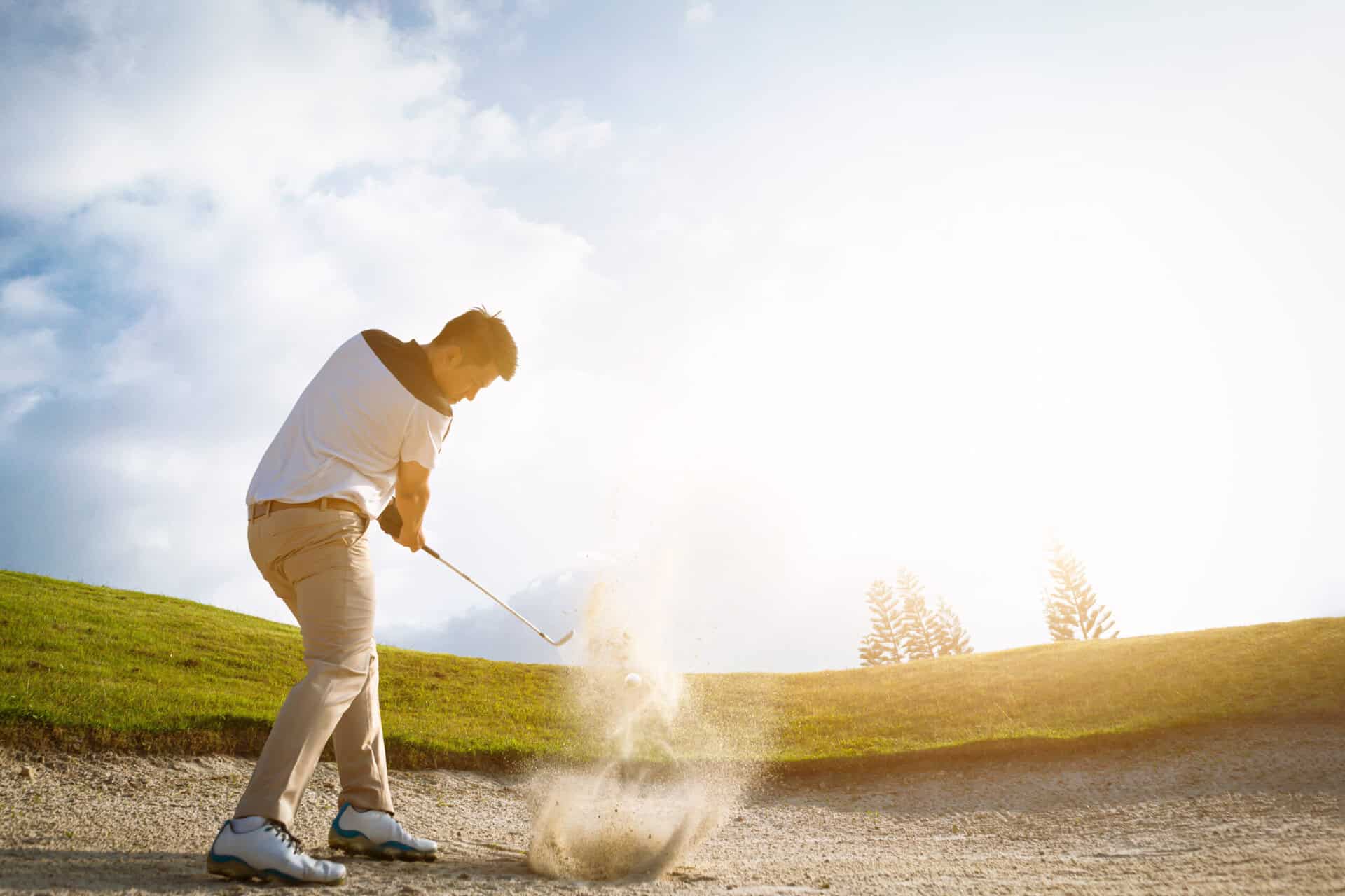 touching sand on backswing in a bunker