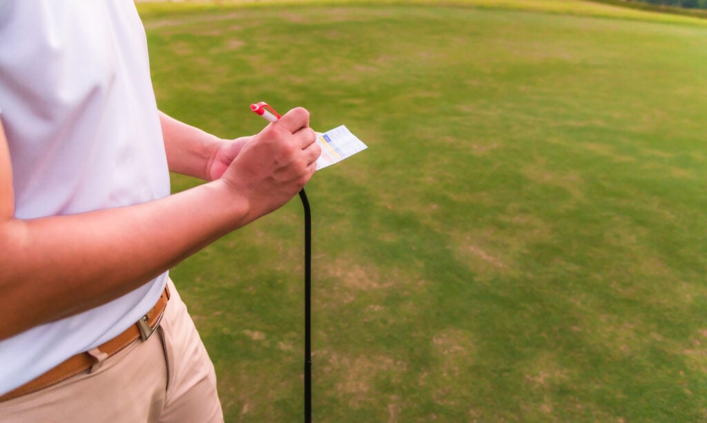 singles match play
A player writes out a scorecard | Source: Adobe Stock