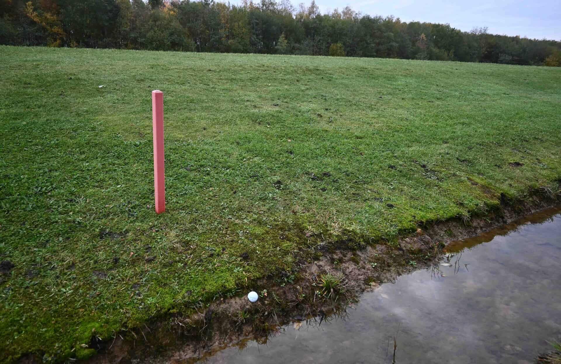 plugged ball in a hazard