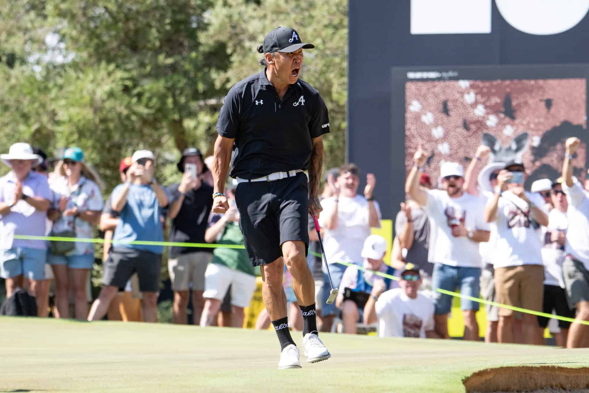 Anthony Kim of 4Aces GC reacts to his putt on the 15th green during the final round of the LIV Golf Adelaide at Grange Golf Club