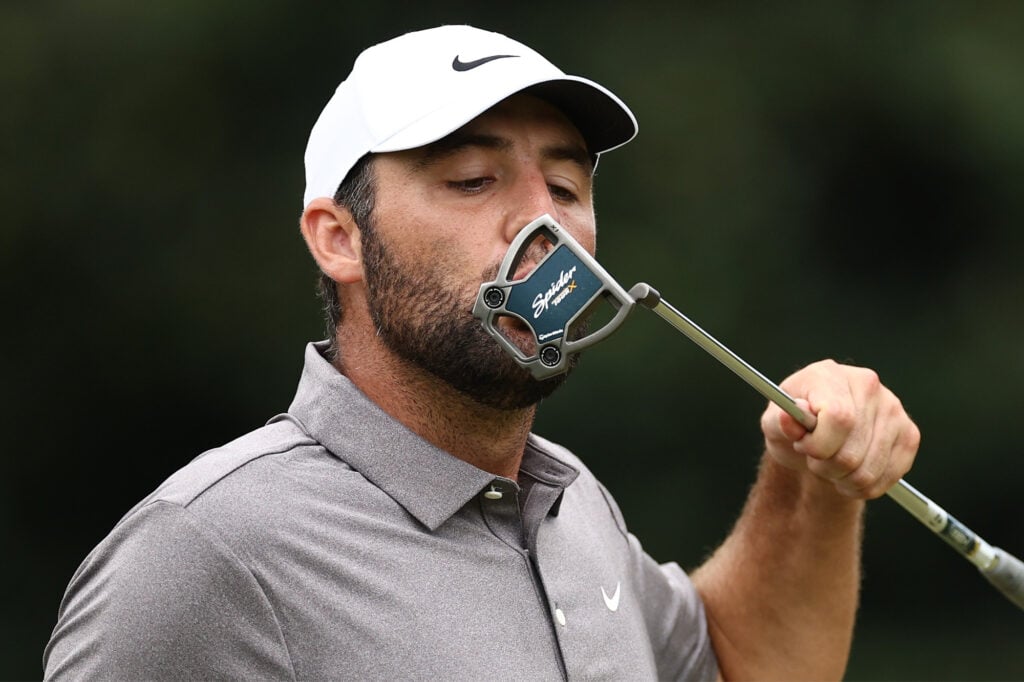 Scottie Scheffler showing his love for his mallet putter.