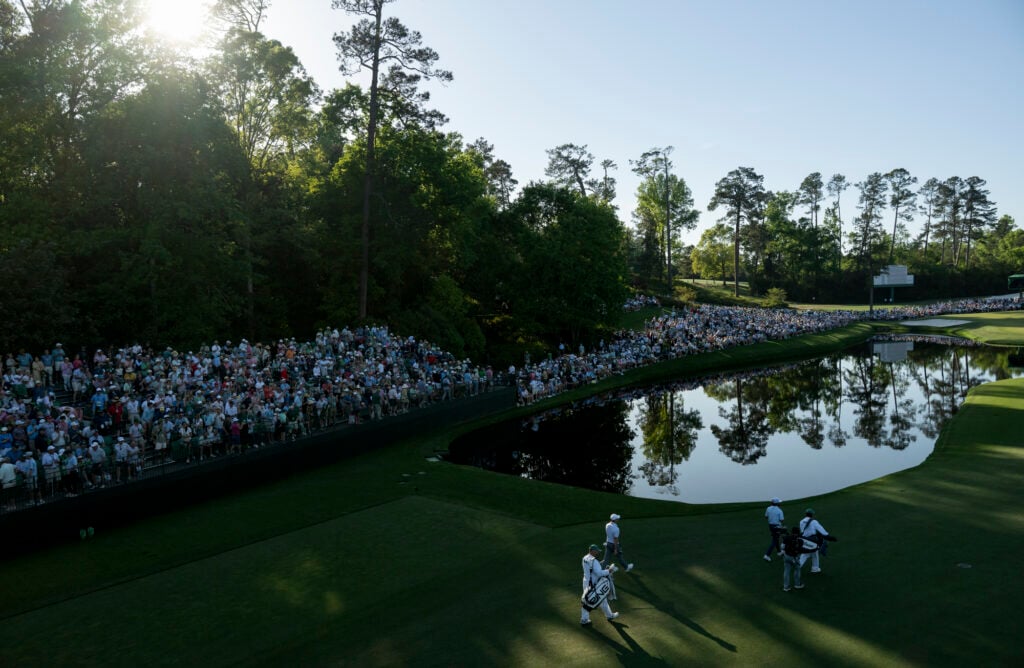 Masters champion Rory McIlroy and Cameron Young of the United States walks towards the No. 16 green during the second round of the Masters, 2026 | Source: Joel Marklund