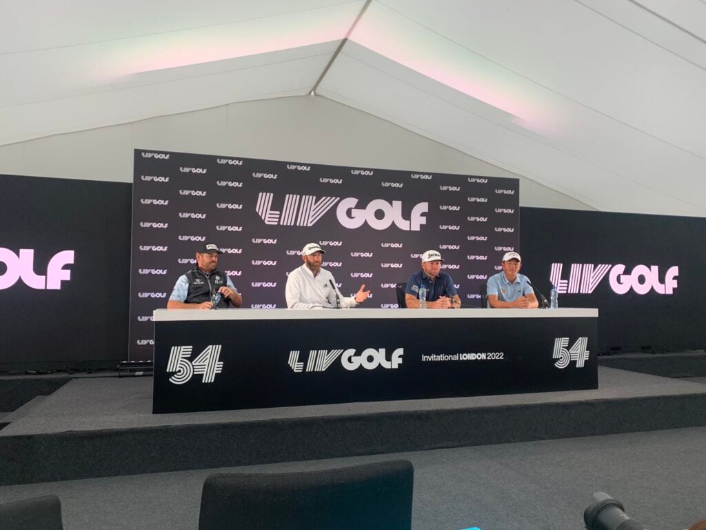 Dustin Johnson, Louis Oosthuizen, and Graeme McDowell in a press conference at LIV Golf London in 2022 | Source: NCG