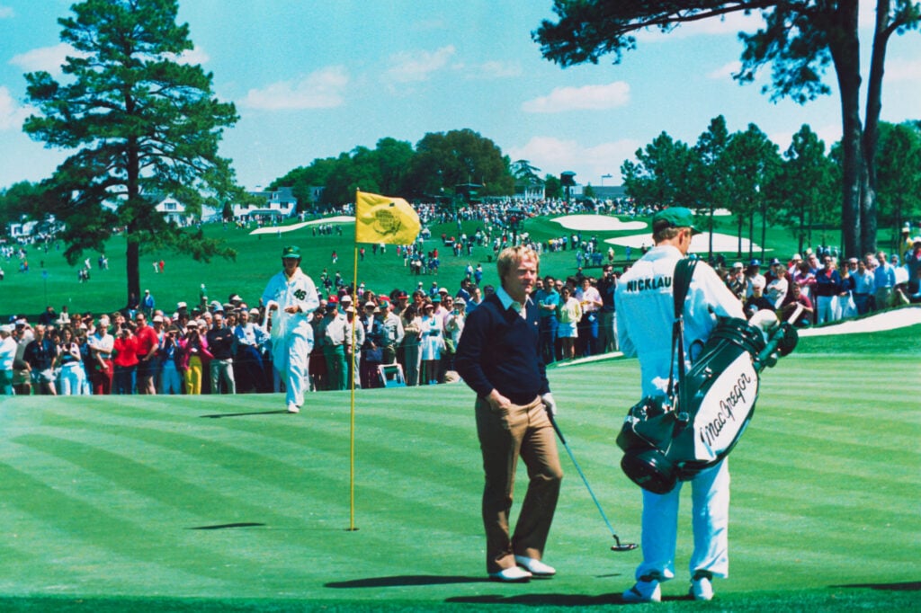 Jack Nicklaus and his son Jack, Jr. leave the 7th green during a practice round for the 50th Masters in 1986 | Source: Getty