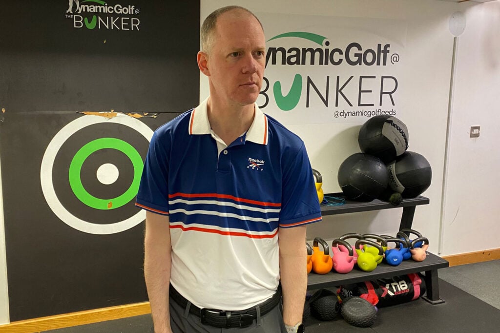 Reebok Men's Centre Stripe Golf Polo Shirt | Source: NCG