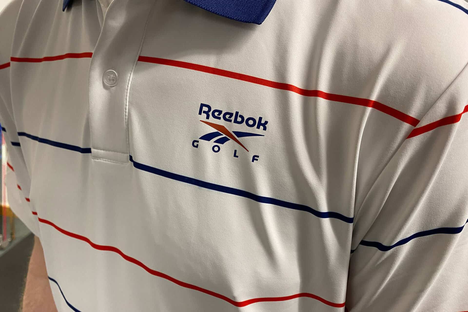 Reebok Men's Thin Stripe Golf Polo Shirt | Source: NCG