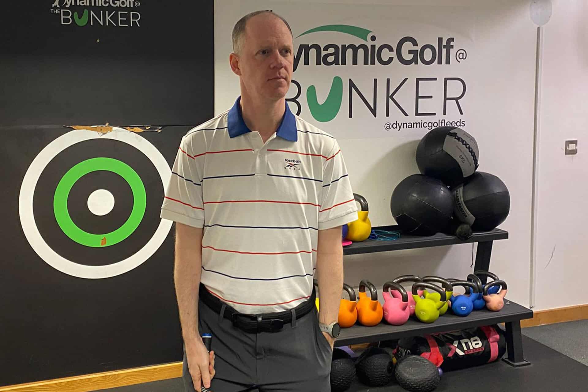 Reebok Men's Thin Stripe Golf Polo Shirt | Source: NCG