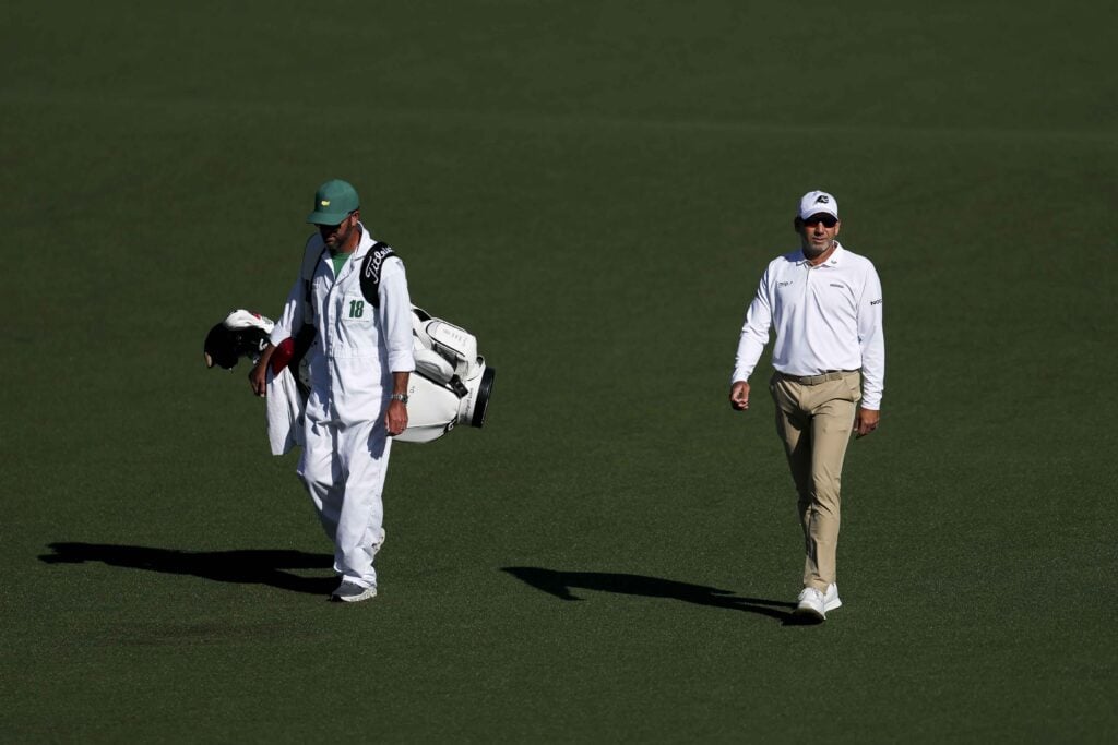 Sergio Garcia of Spain and his caddie Benjamin Thompson walk the second hole during the second round of the 2026 Masters Tournament at Augusta National Golf Club | Source: Andrew Redington/Getty Images)