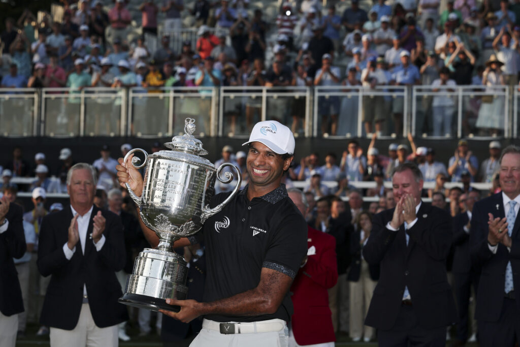 Aaron Rai of England celebrates with The Wanamaker Trophy after winning the 2026 PGA Championship at Aronimink Golf Club | Source: Michael Reaves/Getty Images