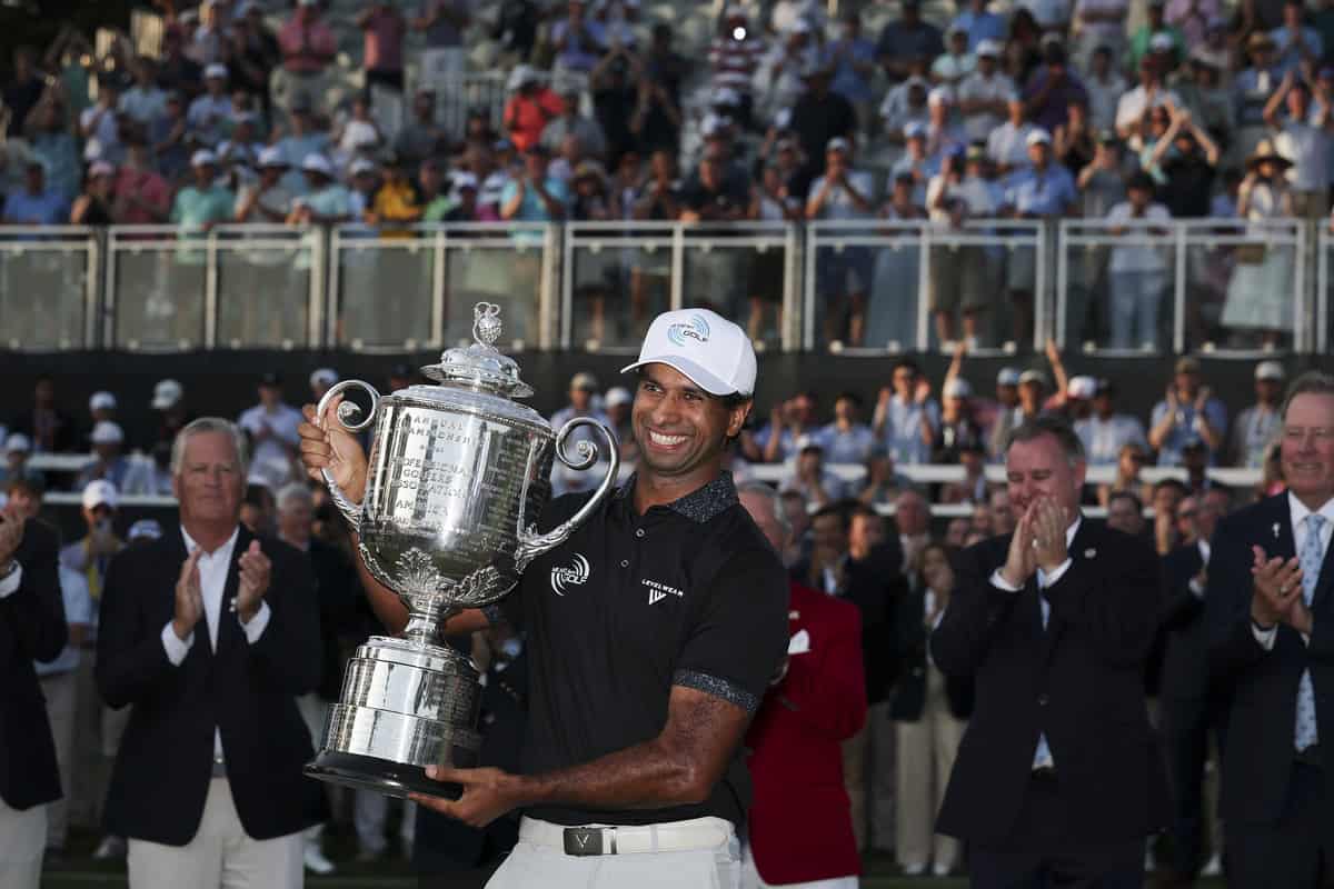 NEWTOWN, PENNSYLVANIA - MAY 17: Aaron Rai of England celebrates with The Wanamaker Trophy after winning the 2026 PGA Championship at Aronimink Golf Club on May 17, 2026 in Newtown, Pennsylvania. (Photo by Michael Reaves/Getty Images)