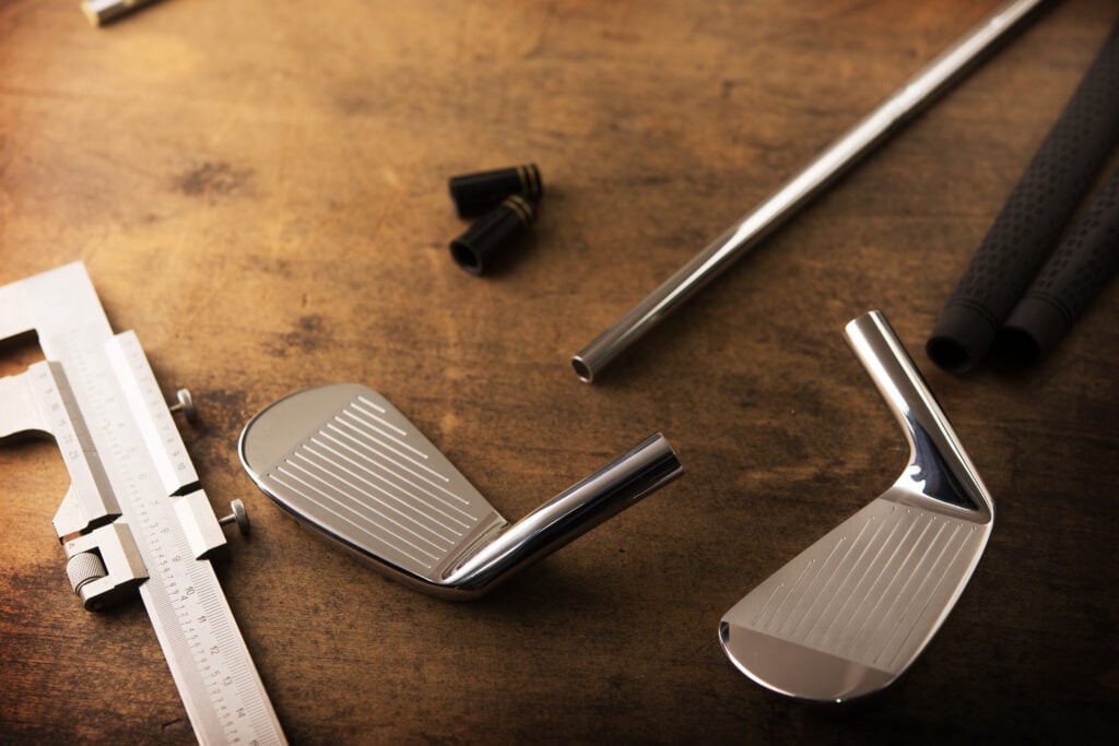 Golf club waiting to be assembled | Source: Adobe Stock