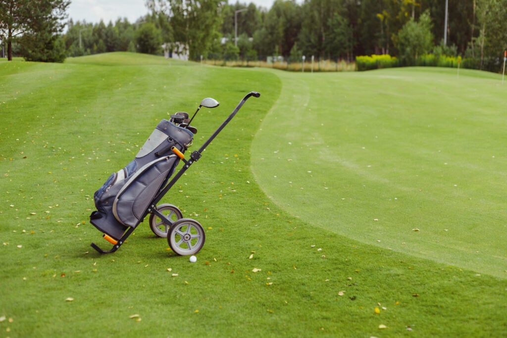 A golf trolley close to a green | Source: Adobe Stock
can I get relief if a trolley moves my ball
