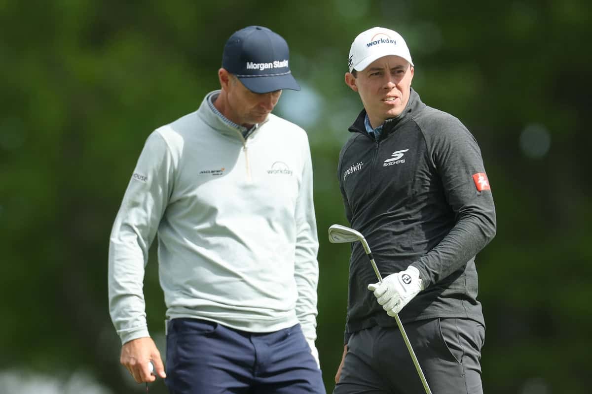 NEWTOWN, PENNSYLVANIA - MAY 14: Matt Fitzpatrick of England follows his shot as Justin Rose of England looks on from the eighth tee during the first round of the PGA Championship at Aronimink Golf Club on May 14, 2026 in Newtown, Pennsylvania. (Photo by Michael Reaves/Getty Images)