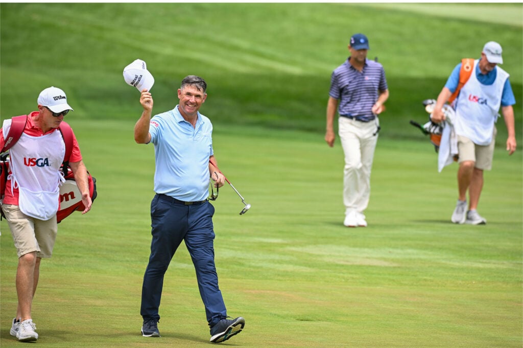 Padraig Harrington waves to fans as he approaches the 18th hole green during the final round of the 2026 U.S. Senior Open at Scioto Country Club in Columbus, Ohio on Sunday, July 5, 2026 | Source: USGA/Edward M. Pio Roda