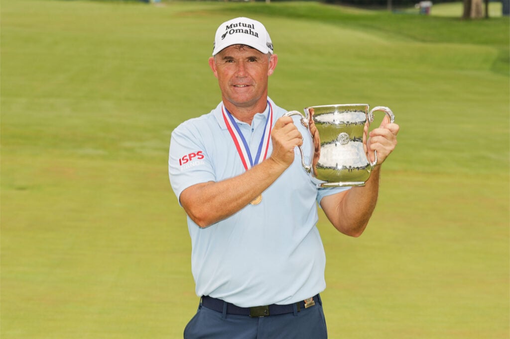 Padraig Harrington poses for a photo with the Francis D. Ouimet Memorial Trophy during the final round of the 2026 U.S. Senior Open at Scioto Country Club in Columbus, Ohio on Sunday, July 5, 2026 | Source: USGA/Jeff Haynes