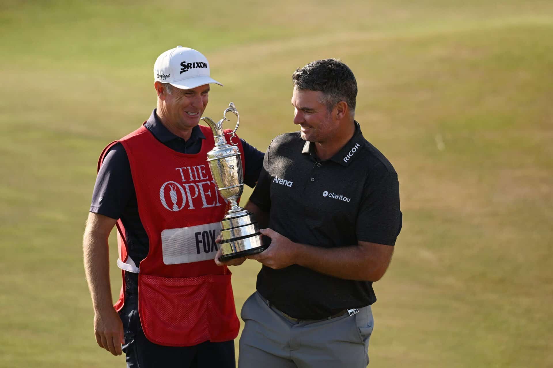 Ryan Fox of New Zealand poses with the Claret Jug and caddie Dean Smith following victory during Day Four of the The 154th Open Championship at Royal Birkdale on July 19, 2026 in Southport, England. (Photo by Charlie Crowhurst/R&A/R&A via Getty Images)