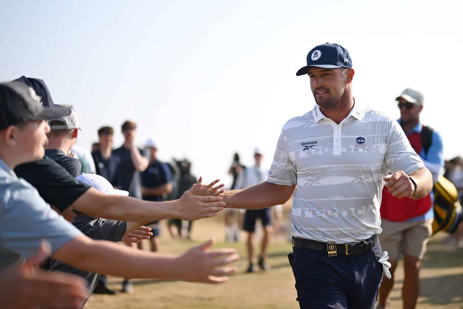 Bryson DeChambeau of the United States greets spectators during Day Three of the The 154th Open Championship at Royal Birkdale on July 18, 2026 in Southport, England. (Photo by Oisin Keniry/R&A/R&A via Getty Images)