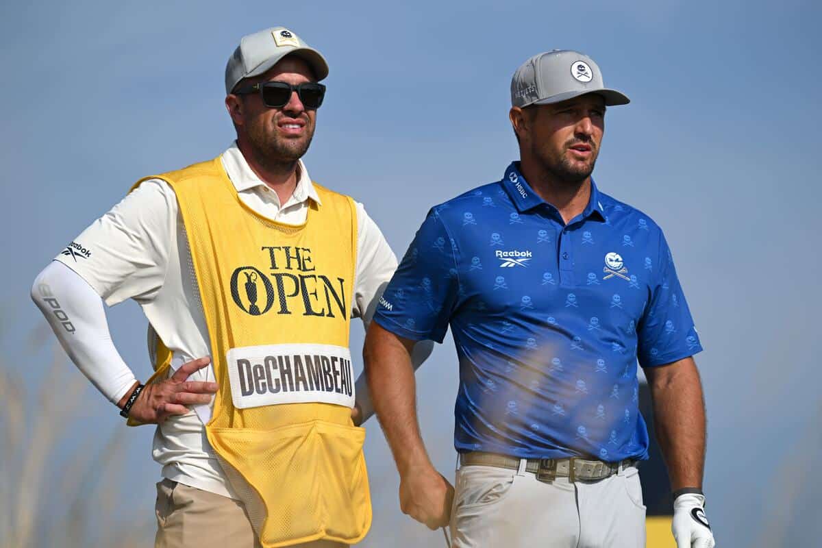 Bryson DeChambeau of the United States looks across the 11th hole with his caddie during Day Two of the The 154th Open Championship at Royal Birkdale on July 17, 2026 in Southport, England. (Photo by Stuart Kerr/R&A/R&A via Getty Images)