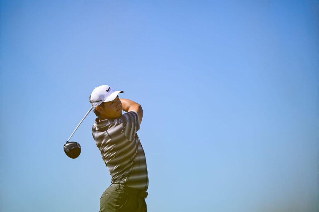 Tom Kim plays his tee shot on the ninth hole during the final round of the 2026 U.S. Open at Shinnecock Hills Golf Club in Southampton, N.Y. on Sunday, June 21, 2026 | Source: Logan Whitton/USGA