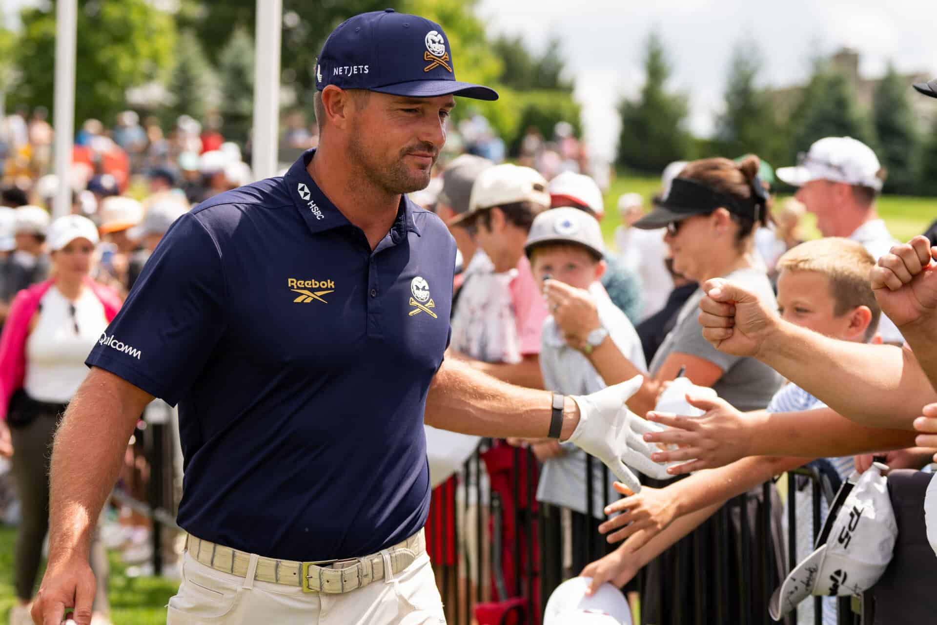 Captain Bryson DeChambeau of Crushers GC high fives fans before the final round of LIV Golf Indianapolis at The Club at Chatham Hills on Sunday, August 23, 2026 in Westfield, Indiana. (Photo by Pedro Salado/LIV Golf)