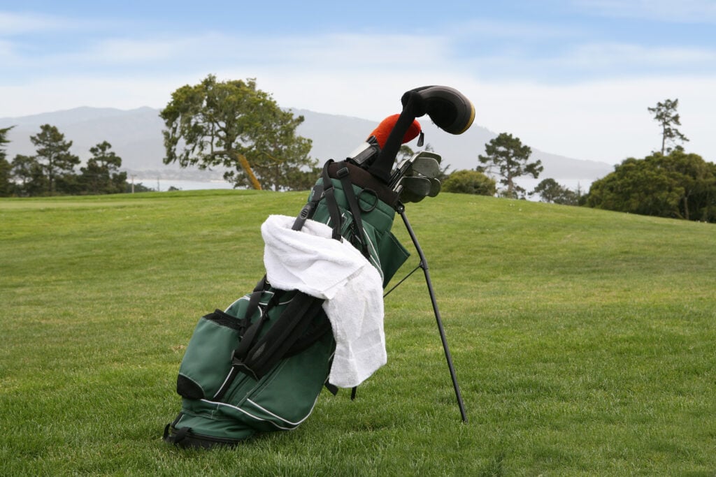 Pack a big golf towel when you play - you never know when it will come in handy! | Source: Adobe Stock