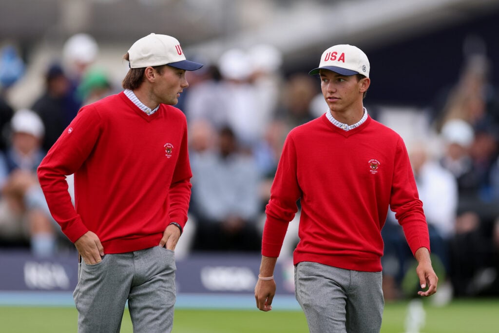 Tyler Watts and Miles Russell of Team USA walk on the first hole during the foursomes matches on day two of the Walker Cup at Lahinch Golf Club | Source: Warren Little/Getty Images