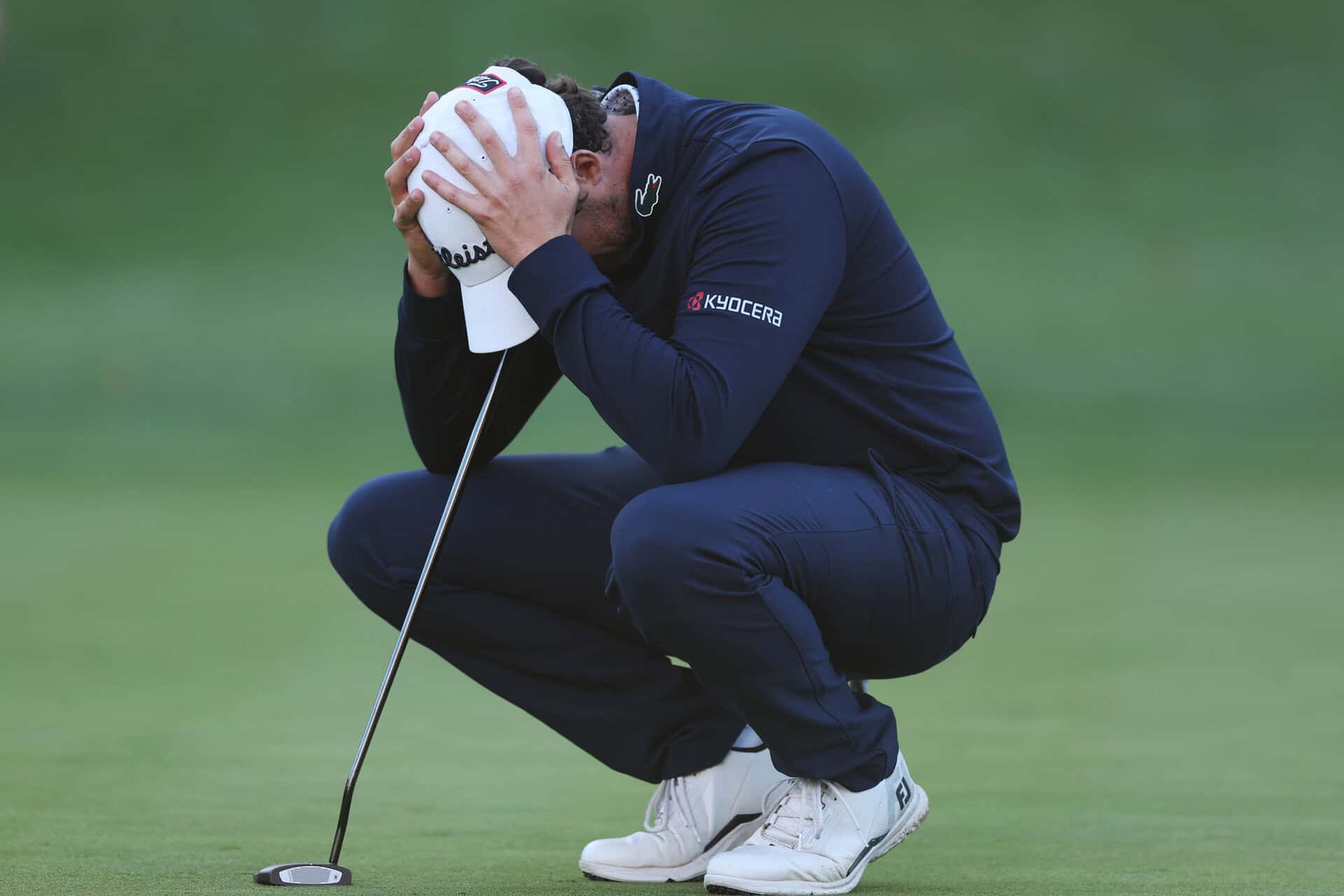 VIRGINIA WATER, ENGLAND - SEPTEMBER 20: Manuel Elvira of Spain reacts following a double bogey on the 18th green on day four of the BMW PGA Championship at Wentworth Golf Club on September 20, 2026 in Virginia Water, England. (Photo by Andrew Redington/Getty Images)