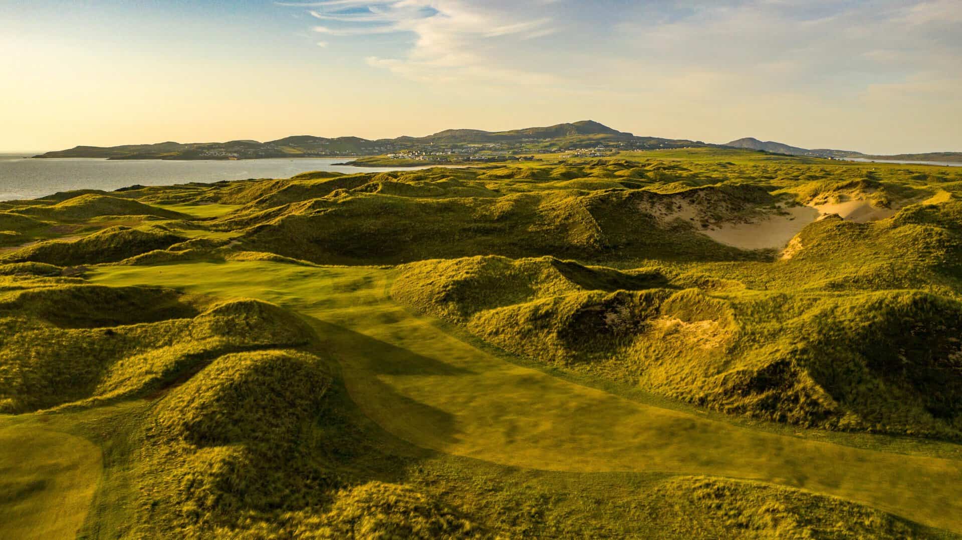 The par-4 2nd at St Patrick’s Links – with Sheephaven Bay beyond